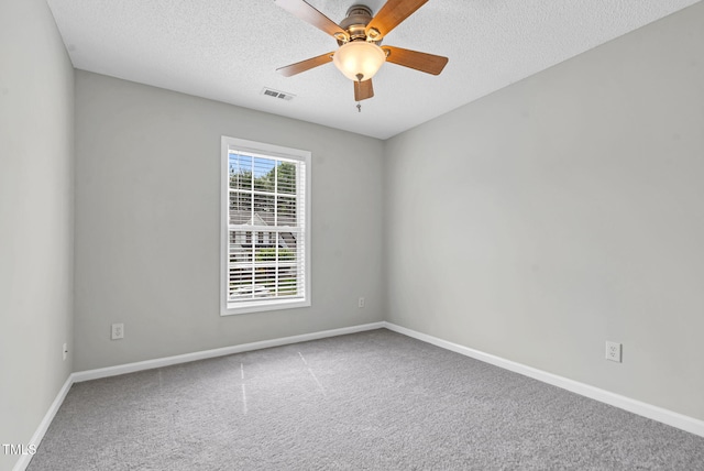 8820 Waynick Dr, Raleigh, NC 27617 - carpeted empty room with a textured ceiling, a ceiling fan, and baseboards