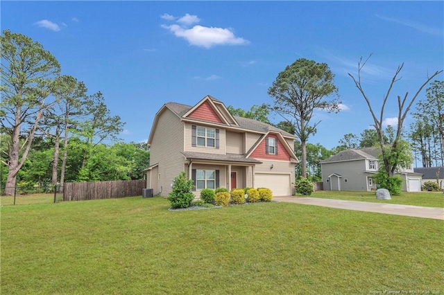 craftsman inspired home featuring concrete driveway, central AC unit, and an attached garage