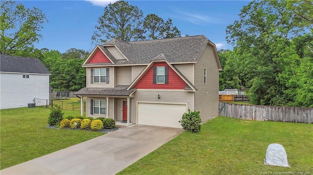 craftsman house with driveway, an attached garage, and roof with shingles