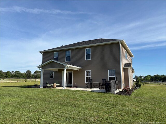 back of house featuring a patio area