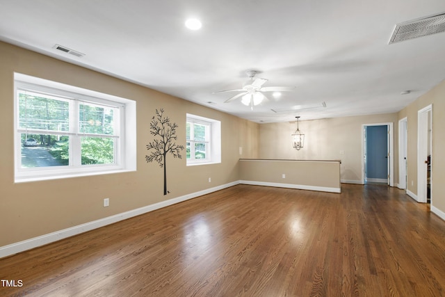 1005 Temple St, Raleigh, NC 27609 - empty room with a ceiling fan, baseboards, and dark wood-style flooring