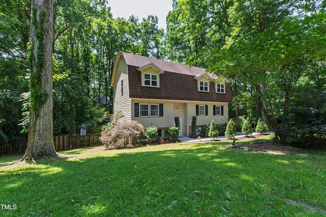 1005 Temple St, Raleigh, NC 27609 - view of front of house with a gambrel roof and a shingled roof