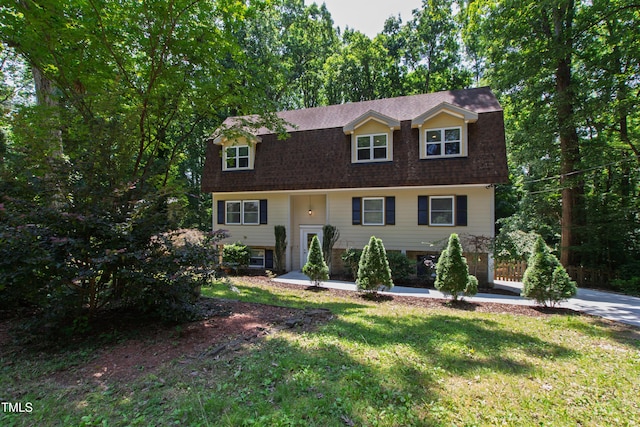 1005 Temple St, Raleigh, NC 27609 - view of front of property with a front lawn, roof with shingles, and a gambrel roof