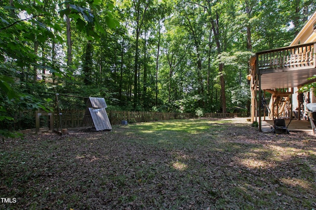 1005 Temple St, Raleigh, NC 27609 - fenced backyard featuring a deck