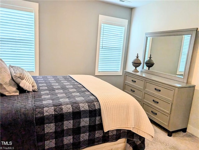 3904 Lundin Dr, Greensboro, NC 27407 - bedroom with light colored carpet