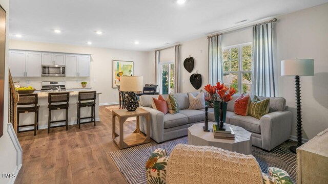 800 Bullhorn Dr, Wake Forest, NC 27587 - living room featuring wood finished floors and recessed lighting