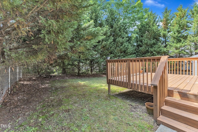 view of yard with a wooden deck