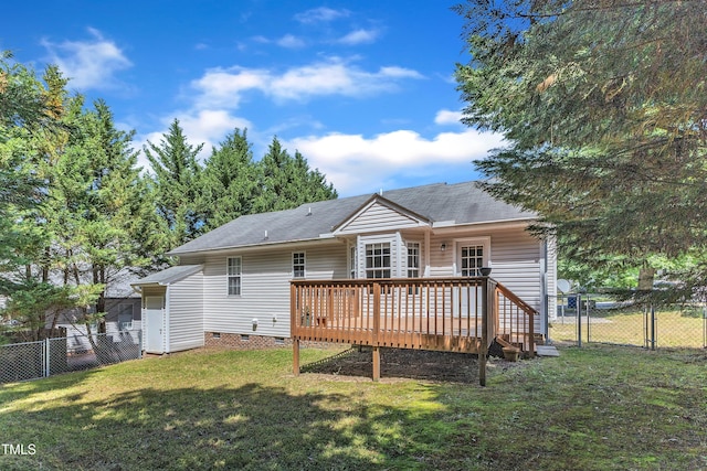 rear view of property featuring crawl space, a wooden deck, a gate, and roof with shingles