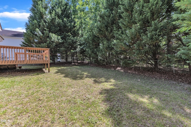 view of yard with a deck