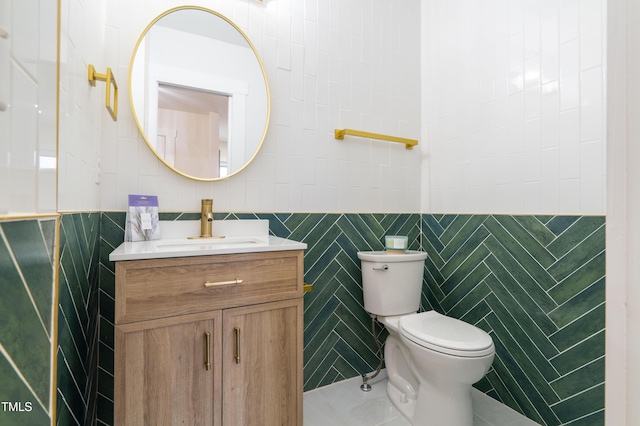 2515 W Club Blvd, Durham, NC 27705 - bathroom featuring tile walls, toilet, tile patterned floors, and vanity