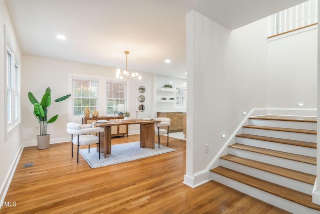 2515 W Club Blvd, Durham, NC 27705 - dining space with stairs, light wood-style floors, baseboards, a chandelier, and recessed lighting