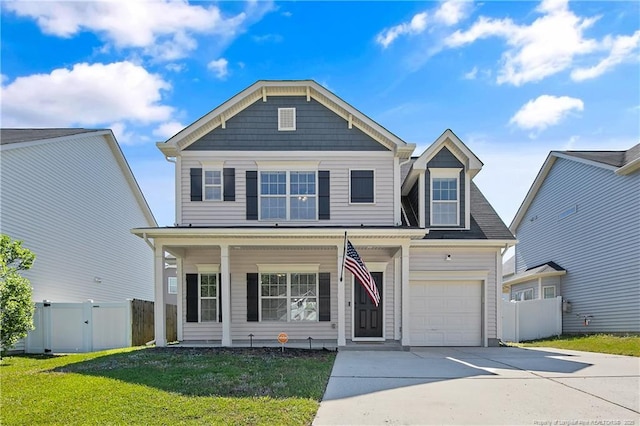 view of front of house with a porch and concrete driveway