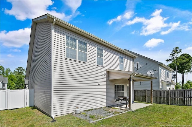 back of house with a patio area