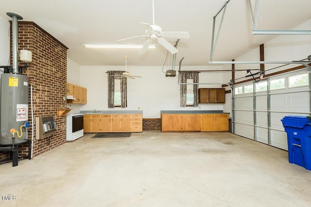 garage featuring a sink, gas water heater, and ceiling fan