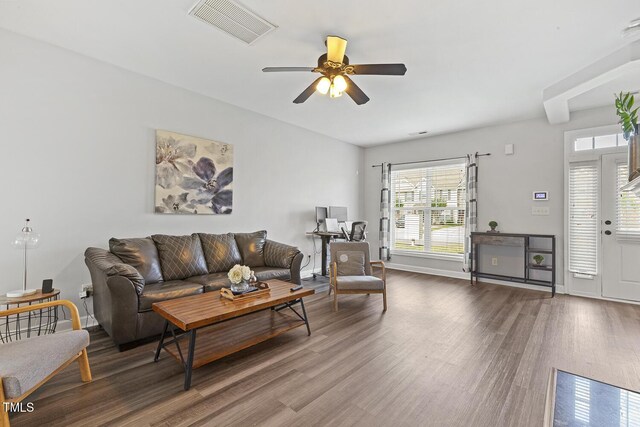 223 Morgan Brook Way, Rolesville, NC 27571 - living area featuring dark wood-style flooring, a ceiling fan, and baseboards