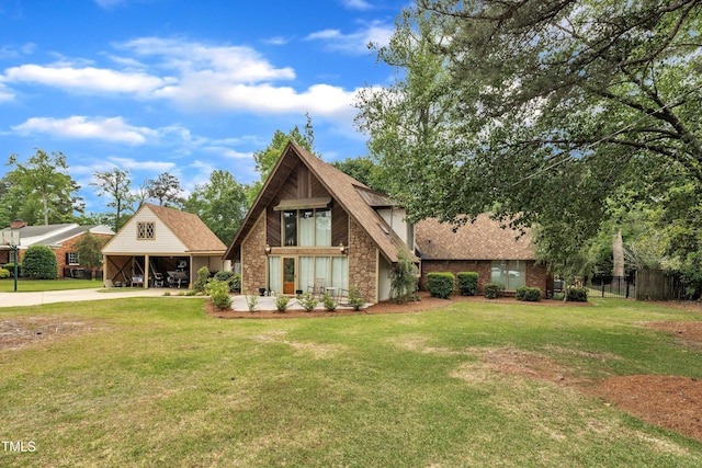 view of front facade with stone siding, driveway, and a shingled roof