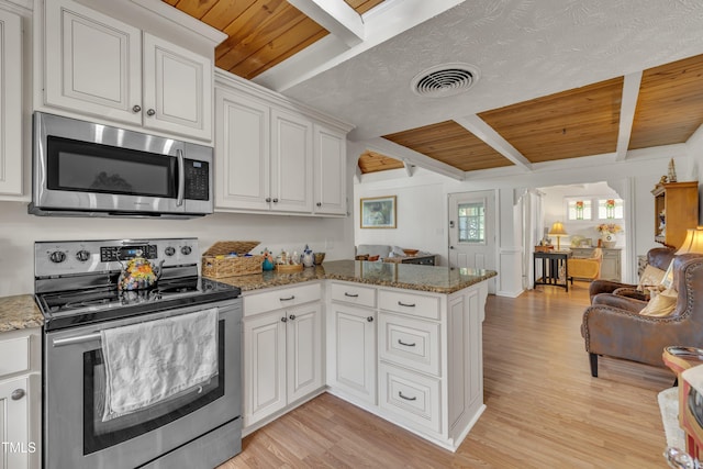 kitchen with stainless steel appliances, wooden ceiling, beam ceiling, light wood-style flooring, and open floor plan