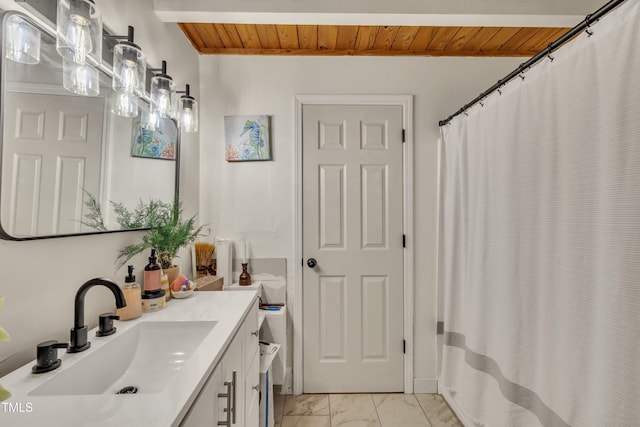 full bathroom featuring marble look tiles, wooden ceiling, and vanity