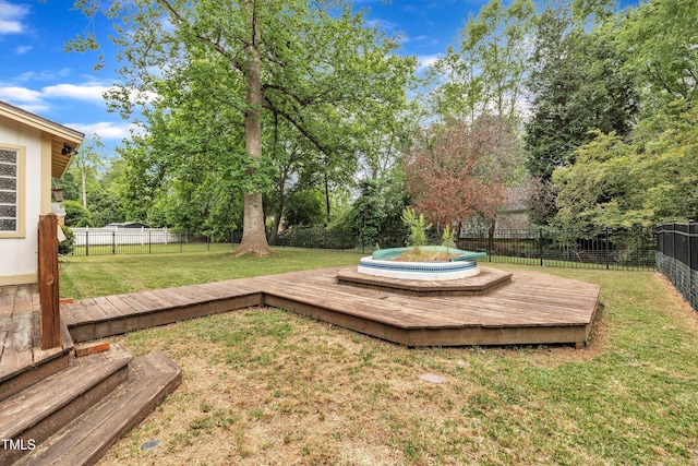 view of yard with a wooden deck