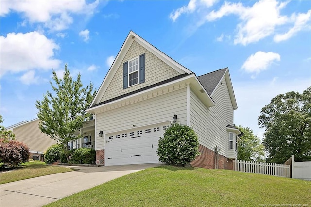 view of side of home featuring brick siding, driveway, and an attached garage