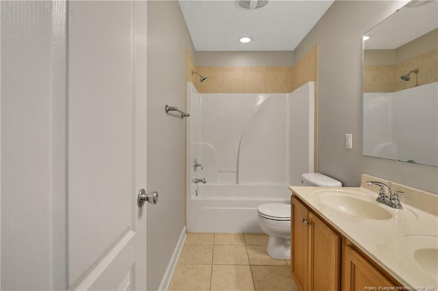 full bath with toilet, tile patterned flooring, double vanity, shower / tub combination, and recessed lighting