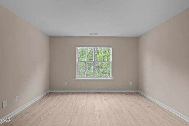 1020 Kingston Grove Dr, Cary, NC 27519 - unfurnished room with wood finished floors and baseboards