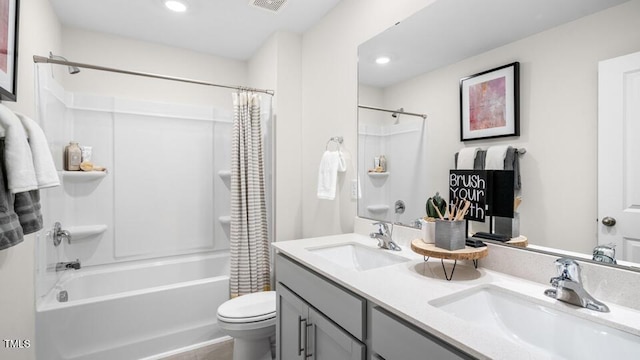 816 Bullhorn Dr, Wake Forest, NC 27587 - bathroom featuring toilet, shower / bath combination with curtain, recessed lighting, and double vanity