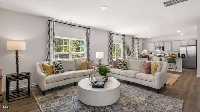 816 Bullhorn Dr, Wake Forest, NC 27587 - living room featuring dark wood finished floors and recessed lighting