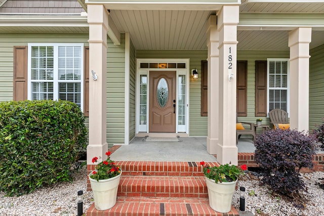 182 Brendamoore Ct, Fuquay Varina, NC 27526 - view of exterior entry featuring a porch