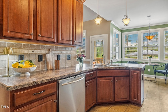 182 Brendamoore Ct, Fuquay Varina, NC 27526 - kitchen with dishwasher, a sink, a peninsula, backsplash, and dark countertops