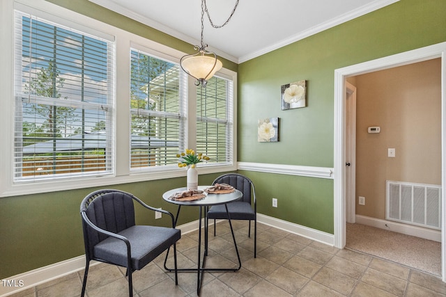 182 Brendamoore Ct, Fuquay Varina, NC 27526 - dining space featuring ornamental molding, baseboards, and tile patterned floors