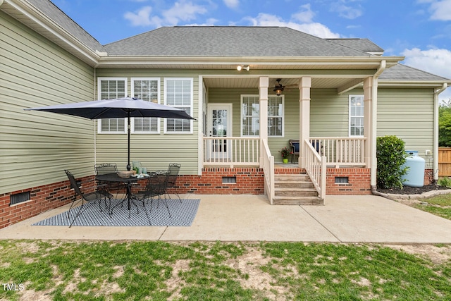 182 Brendamoore Ct, Fuquay Varina, NC 27526 - back of property with ceiling fan, a porch, and roof with shingles