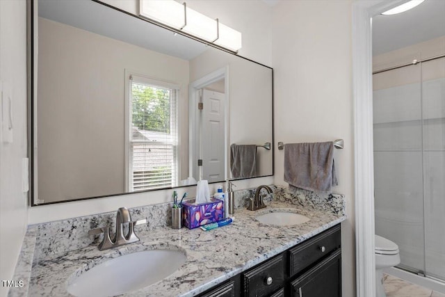 111 Killam Ct Unit 2A, Cary, NC 27513 - full bath with a stall shower, toilet, double vanity, and marble look tile flooring