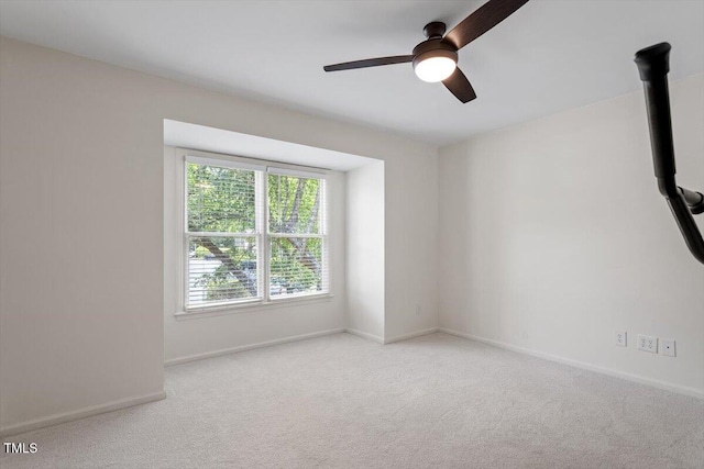 111 Killam Ct Unit 2A, Cary, NC 27513 - carpeted empty room with healthy amount of natural light, ceiling fan, and baseboards