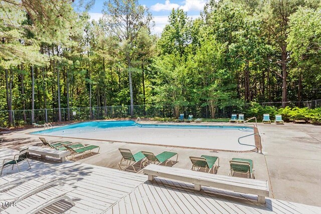 111 Killam Ct Unit 2A, Cary, NC 27513 - community pool featuring fence and a patio