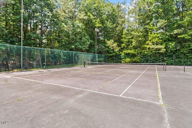 111 Killam Ct Unit 2A, Cary, NC 27513 - view of tennis court featuring fence