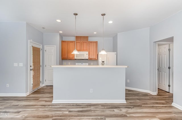 958 Shining Wire Way, Morrisville, NC 27560 - kitchen featuring white appliances, light wood-style floors, decorative light fixtures, light countertops, and recessed lighting