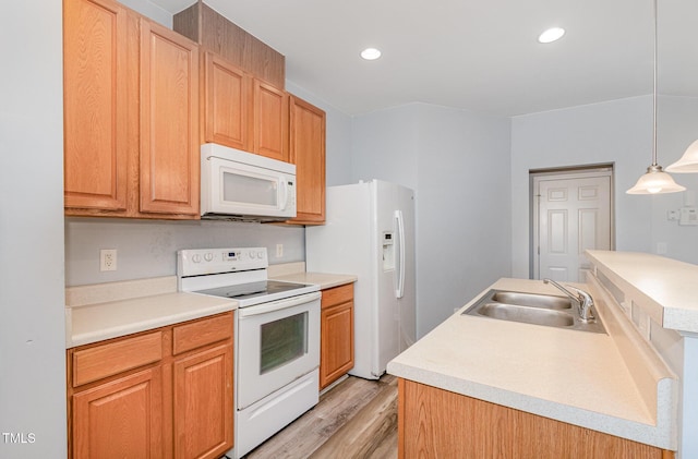 958 Shining Wire Way, Morrisville, NC 27560 - kitchen with white appliances, light wood-type flooring, a kitchen island with sink, recessed lighting, and pendant lighting