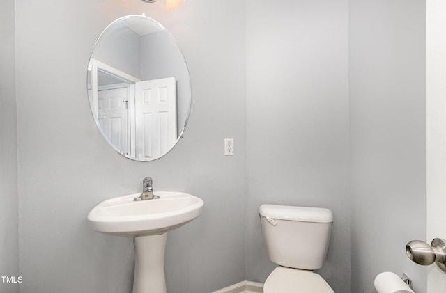958 Shining Wire Way, Morrisville, NC 27560 - bathroom with toilet and baseboards