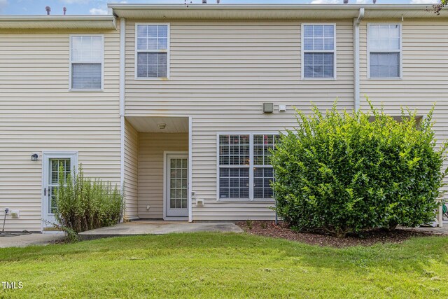 958 Shining Wire Way, Morrisville, NC 27560 - back of property featuring a yard and a patio