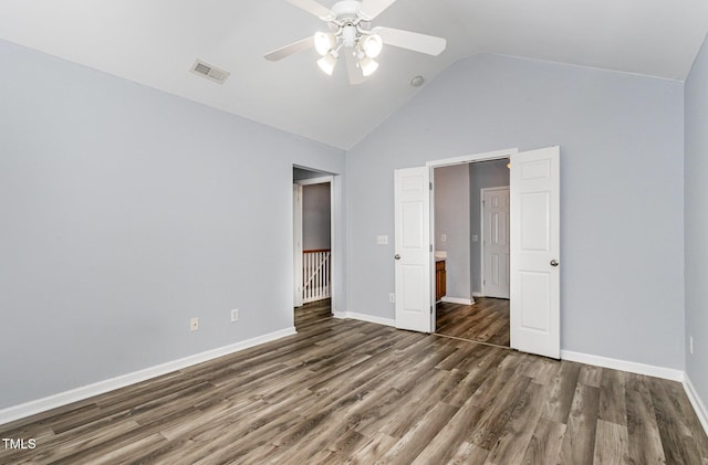 958 Shining Wire Way, Morrisville, NC 27560 - unfurnished bedroom with dark wood-type flooring, high vaulted ceiling, and a ceiling fan