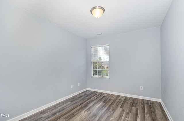 958 Shining Wire Way, Morrisville, NC 27560 - empty room featuring dark wood-style floors and baseboards
