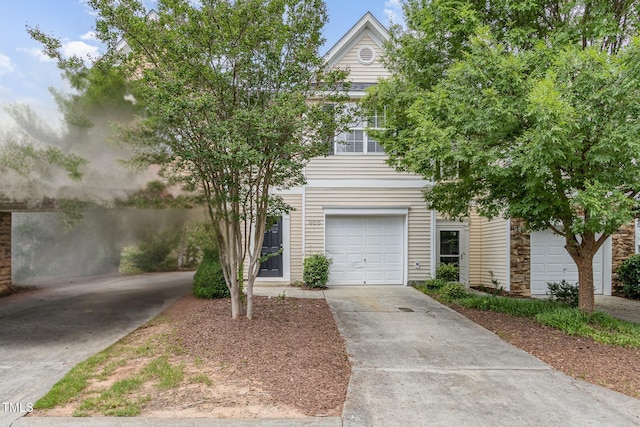 958 Shining Wire Way, Morrisville, NC 27560 - view of property hidden behind natural elements featuring driveway and stone siding