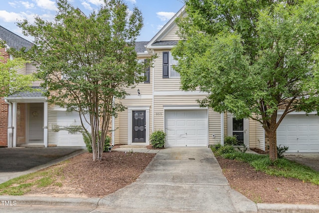 958 Shining Wire Way, Morrisville, NC 27560 - obstructed view of property with concrete driveway and a shingled roof