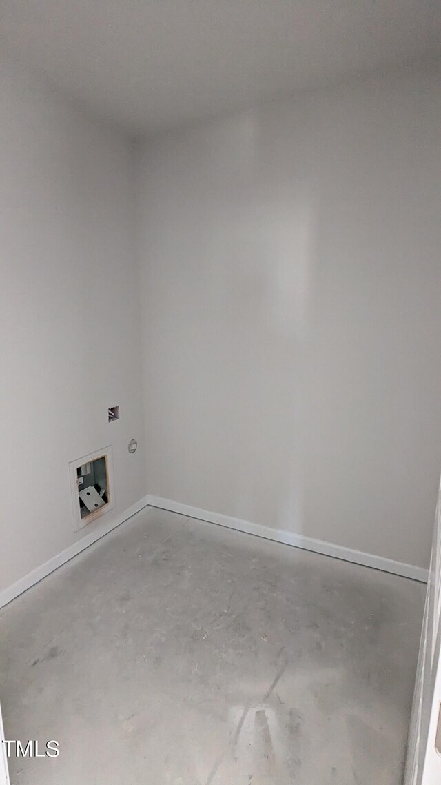 laundry room featuring hookup for a washing machine and baseboards