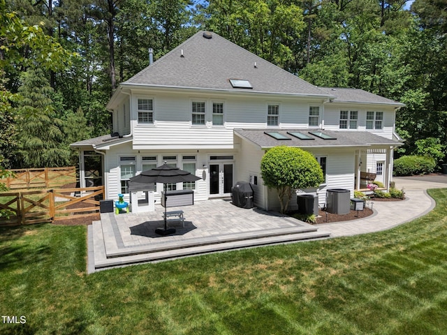 120 Harmony Hill Ln, Cary, NC 27513 - back of house with french doors, roof with shingles, central AC, and a deck