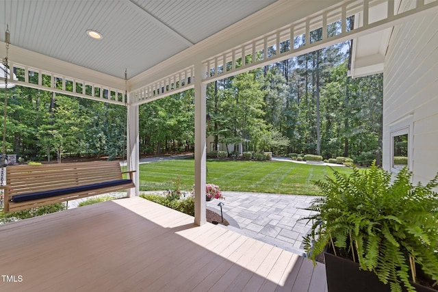 120 Harmony Hill Ln, Cary, NC 27513 - wooden terrace featuring a lawn and view of scattered trees