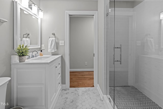 120 Harmony Hill Ln, Cary, NC 27513 - full bathroom featuring a stall shower, vanity, tile patterned floors, and baseboards