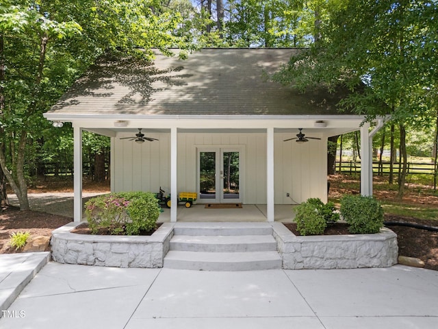 120 Harmony Hill Ln, Cary, NC 27513 - view of exterior entry featuring a ceiling fan, covered porch, french doors, and a shingled roof