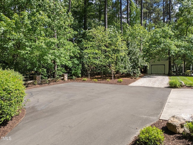 120 Harmony Hill Ln, Cary, NC 27513 - view of patio / terrace with asphalt driveway and a garage